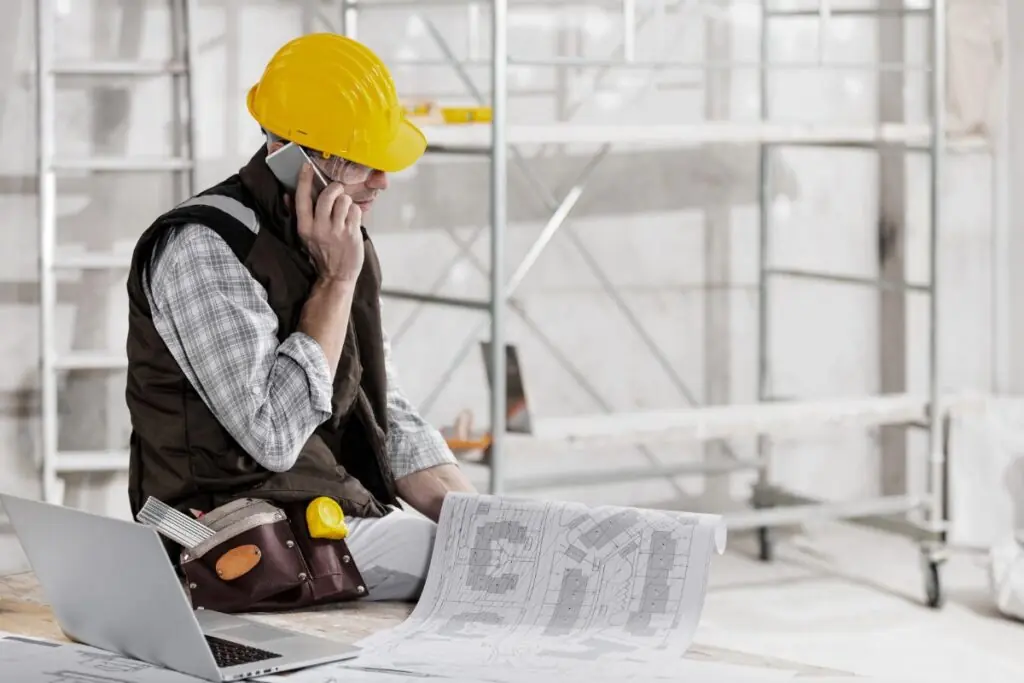 professional contractor calling client on phone