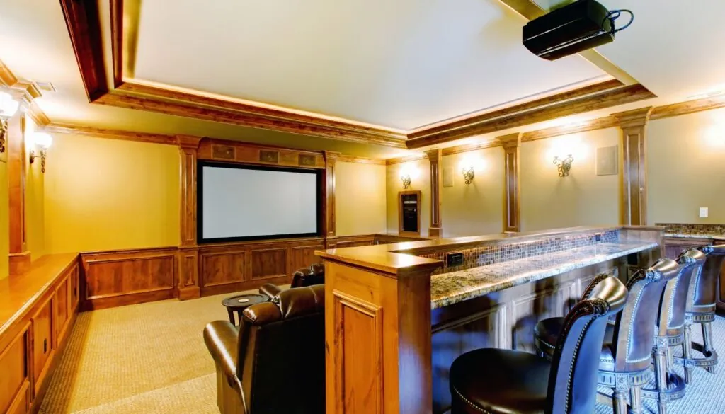 luxury basement home theater design with bar