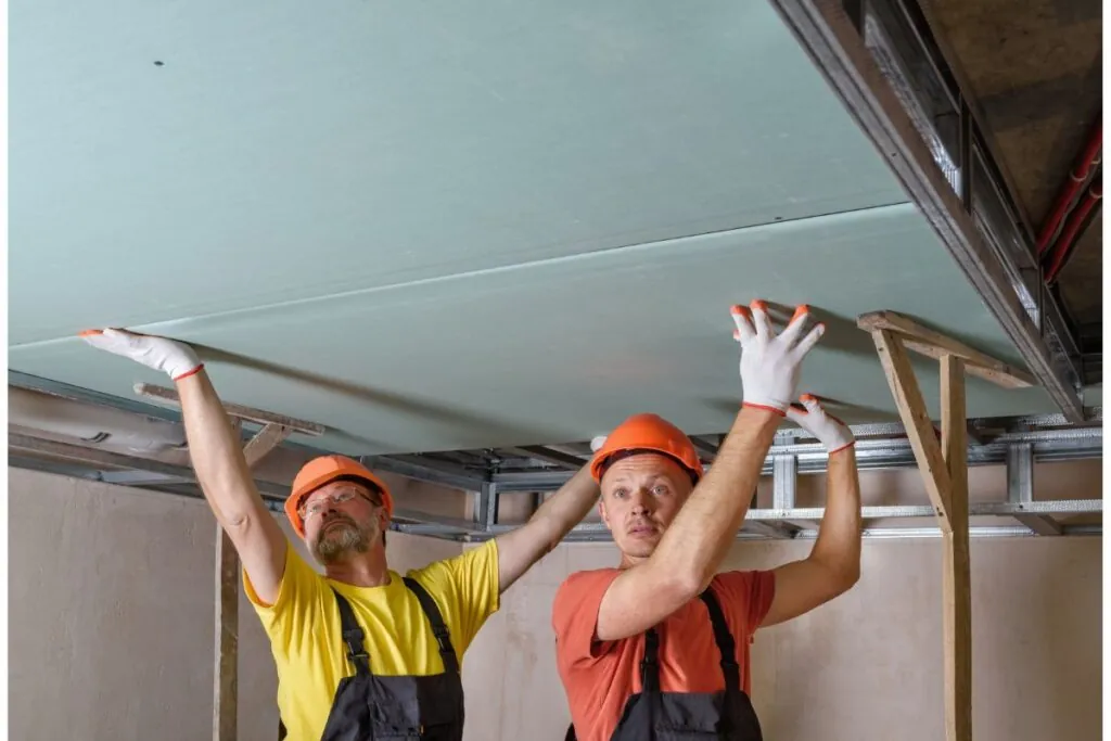 basement finishing contractor installing basement ceiling in Whitman MA