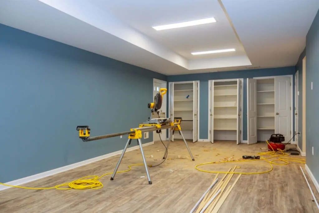 interior construction of basement finishing with drywall installed