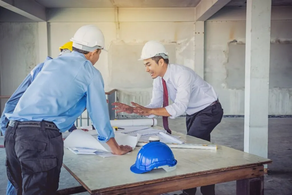 basement contractor reviewing the design for basement renovation